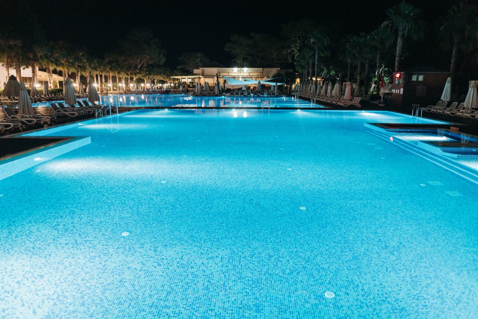 Resort Outdoor Living pool design inspiration in Austin, TX
